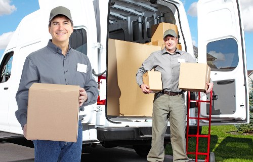 Local moving experts assisting with packing