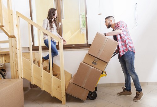 Professional movers handling office equipment in Bermondsey